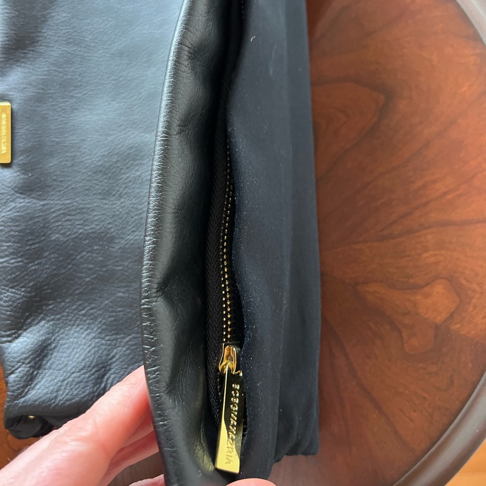 BCBGMaxAzria Black Fold-Over Clutch with Gold Accent - Picture 3 of 9